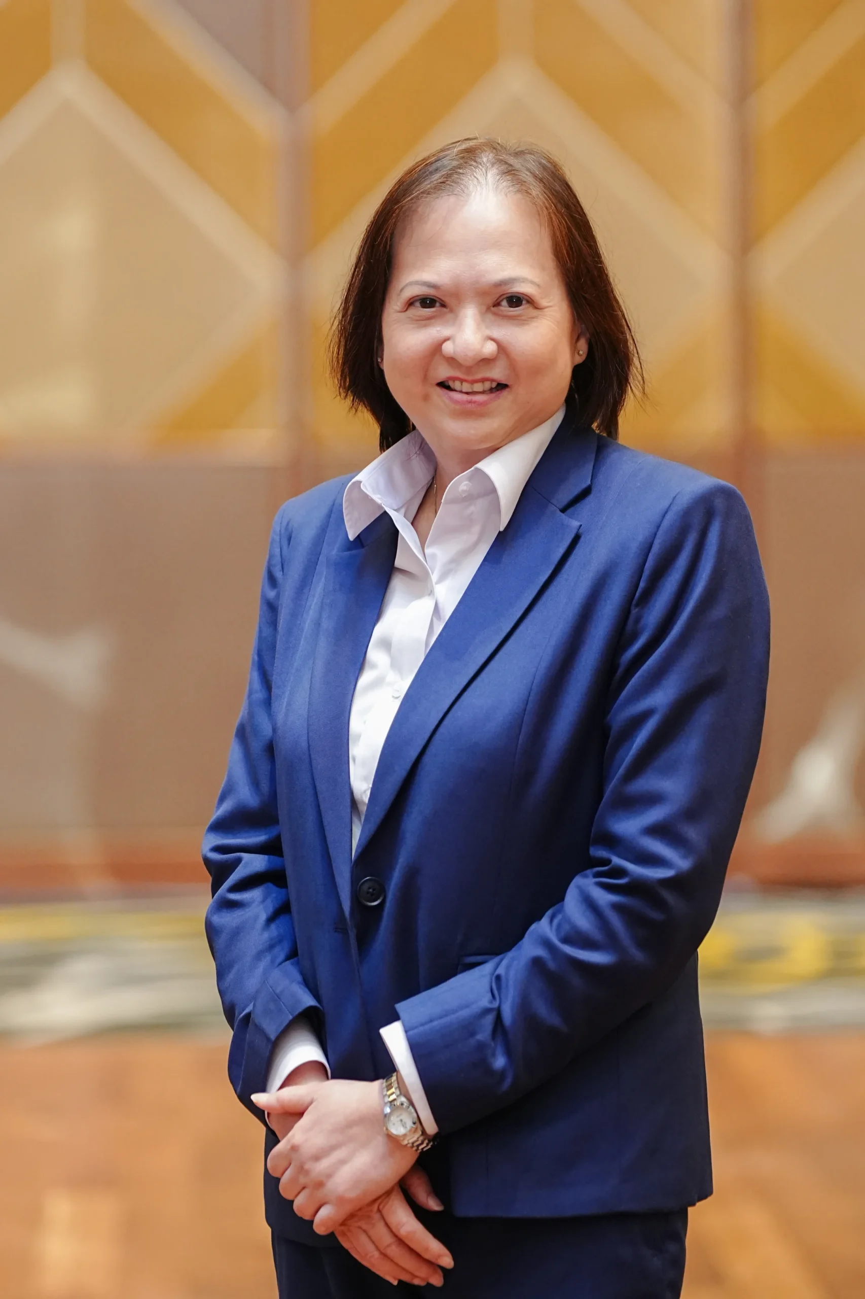 Ms Linda Tey